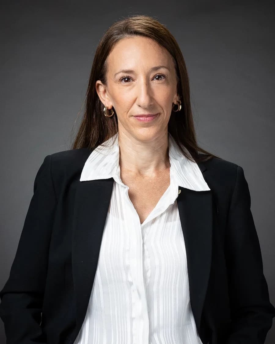 Portrait of Dana Hasson, Partner